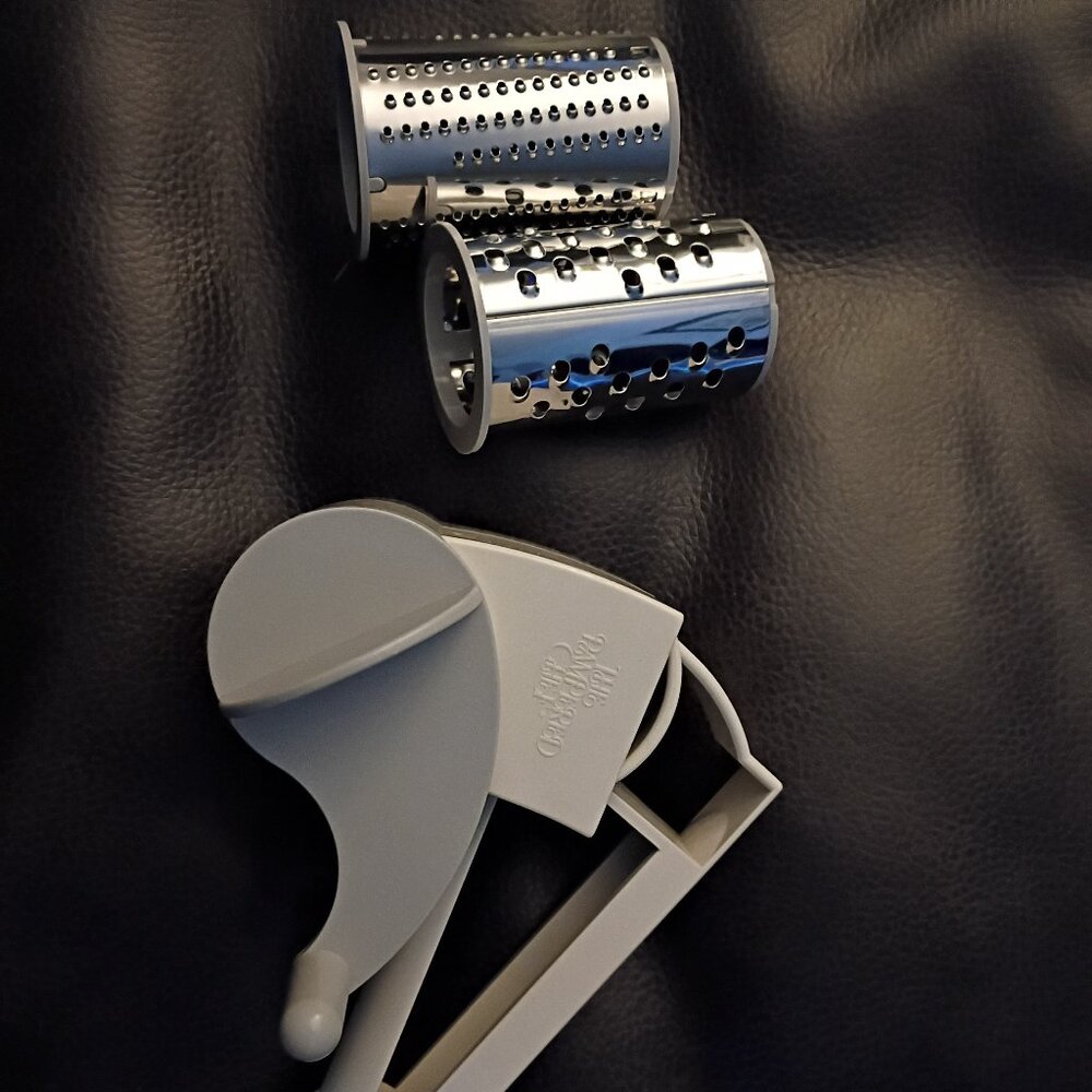 Pampered chef rotary cheese grater with both barrels, left or right handed